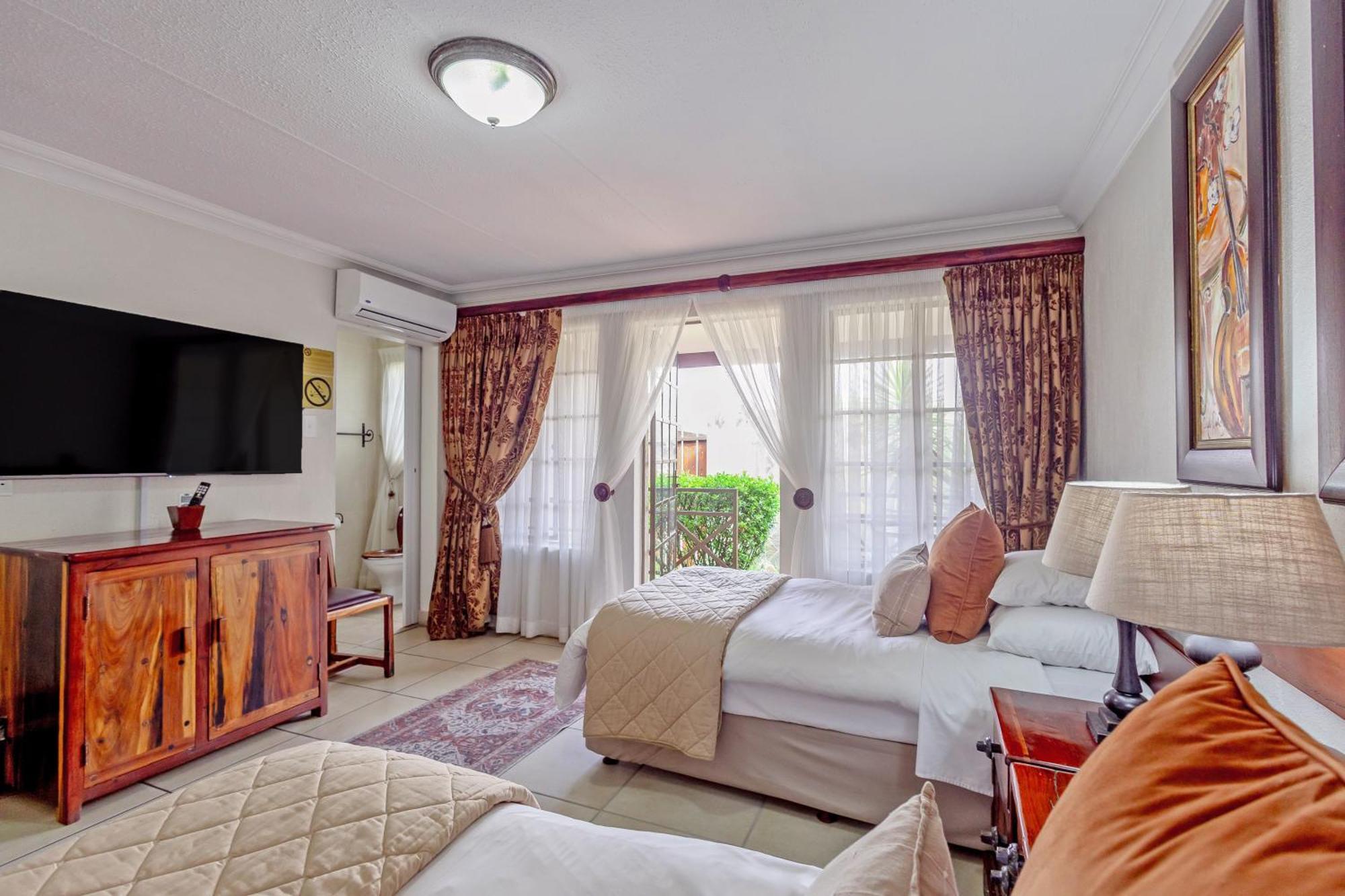 Afrique Boutique Hotel O.R. Tambo Boksburg Zimmer foto